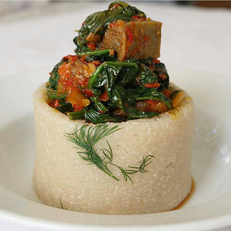 Photo: who ever took time to mold garri and soup like this wasn't hungry