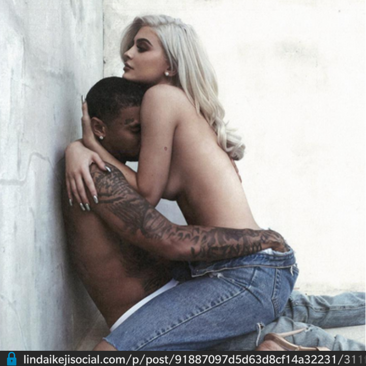 What is wrong with this girl? Kylie Jenner puts bares boobs in Tyga's face in new shoot!